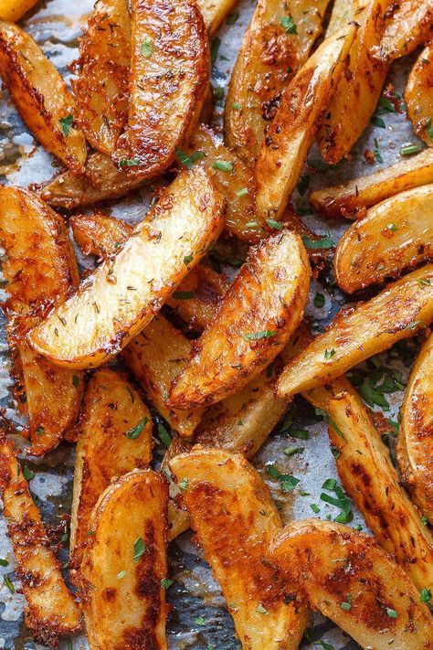 Baked Garlic Parmesan Potato Wedges - Crispy on the outside and tender on the inside, they will blow you away with their simplicity and fantastic flavor! Baked Garlic Parmesan Potato Wedges, Garlic Parmesan Potato Wedges, Parmesan Potato Wedges, Parmesan Potato, Garlic Parmesan Potatoes, Potato Wedges Recipe, Potato Wedges Baked, Wedges Recipe, Parmesan Potatoes