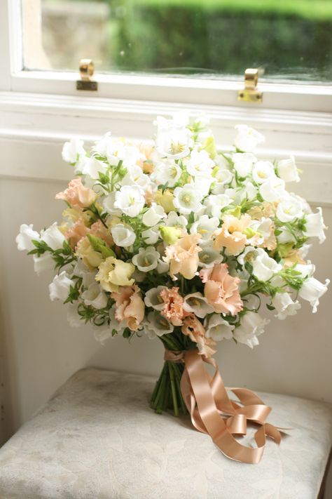 Simple bouquet of white campanula bells and peach eustoma. Campanula Flowers Bouquets, Canterbury Bells Bouquet, Campanula Bouquet, Bell Flower Bouquet, White Peach Bouquet, Bellflower Bouquet, White Garden Bouquet, White Campanula, Eustoma Bouquet