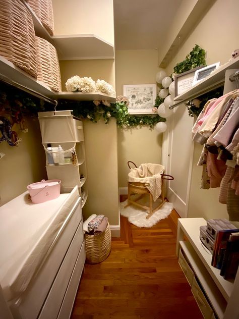 Walk in Closet converted to nursery with Floral Winnie the Pooh theme Turning A Closet Into A Nursery, Closet Converted To Nursery, Nursery Walk In Closet, Closet Nursery Ideas Walk In, Crib In Closet Ideas, Baby Apartment Living, Walk In Closet Nursery Converted, Closet Nursery Converted, Crib In Closet