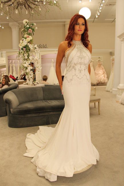 Season 14 Featured Dress: Mark Zunino. Halter top w/ beading. Form fitted with very low back. $9,900. Style: #F87 Wedding Dresses Halter Top Couture Candy, Mark Zunino Wedding Dress Kleinfeld, Cream Fitted Bridal Gown, Beaded Halter Wedding Dress, Sweet Heart Neckline Wedding Dress 2015, White Gown Dress, Bella’s Wedding Dress Twilight, Halter Top Wedding Dress, Mark Zunino