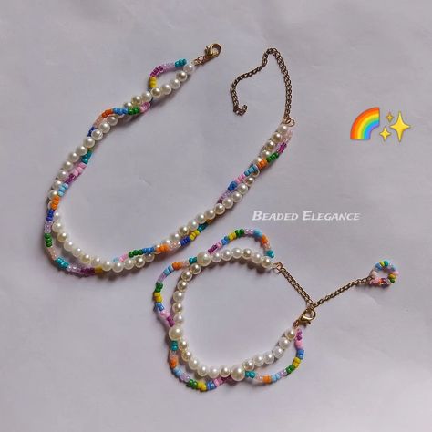 White pearl and rainbow beaded jewel set 🌈 Combo of two 170/- + shipping🦋 Shipping all over India 🎀 DM or whatsapp 9748085164✉️ [Accessory, jewellery, beaded necklace, beads, beaded Elegance, beaded accessories] #beadedjewelleryhandmade #handmadejewelry #beadedelegance #beadedaccessories #handbeaded #rainbownecklace #affordable Elegant Rainbow Beaded Necklace, Adjustable Rainbow Beaded Necklace, Rainbow Pearl Beaded Necklaces, Rainbow Faceted Beads Necklace, Rainbow Necklaces With Heart-shaped Beads, Necklace Beads, Instagram White, Rainbow Necklace, Beaded Jewels