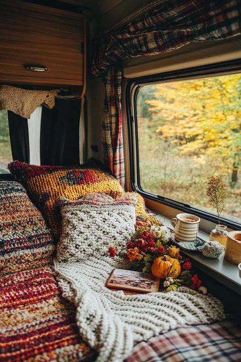 40 Cozy Fall RV Interior Ideas: Warmth and Style for Autumn Travels  As the colors of nature transition to enchanting hues of amber, it's time to think about cozying up your RV for those idyllic autumn travels. But how can you transform your road abode into a warm and stylish sanctuary? Delve into our handpicked, chic selection of 40 Cozy Fall RV…  Read more: https://tastyinteriors.com/40-cozy-fall-rv-interior-ideas-warmth-and-style-for-autumn-travels/ Cozy Trailer, Rv Interior Ideas, Camper Decorating Ideas, Style For Autumn, Boho Camper, Cozy Travel, Custom Rv, Glamper Camper, Cozy Camping