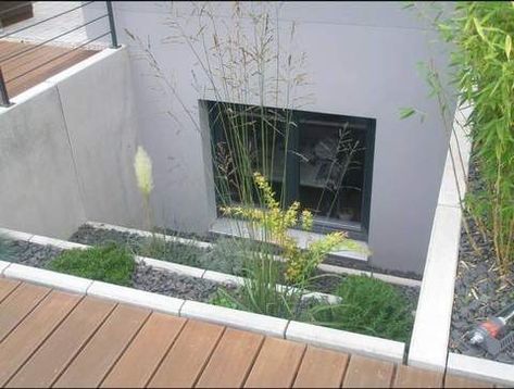 16 Egress Window Well Ideas to Inspire - The Great Egress Co Egress Window Landscaping, Egress Window Well, Basement Window Well, Basement Lighting, Pebble Floor, Egress Window, Window Well, Basement Windows, Basement Apartment