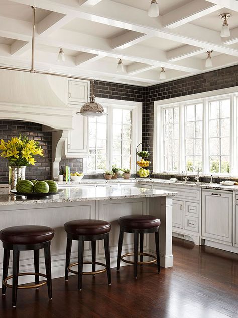 Create contrast with sleek black subway tile. Ideas for kitchen lighting: http://www.bhg.com/kitchen/lighting/light-fixture-ideas/?socsrc=bhgpin090212blacktilekitchen#page=3 Black Subway Tiles, Raw Kitchen, Herringbone Backsplash, Regent Street, All White Kitchen, White Kitchens, Dream Kitchens, Kitchen Trends, Cabinets Organization