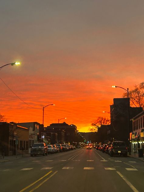 A passenger takes a photo from their seat of downtown traverse city. The sky is a beautiful orange hue as the sun is setting — it emulates peace and calm Michigan Aesthetic, Michigan Camping, Sunset Beautiful, Traverse City Michigan, Sky Pics, Type Shi, Dream Places, All I Ever Wanted, Peaceful Life