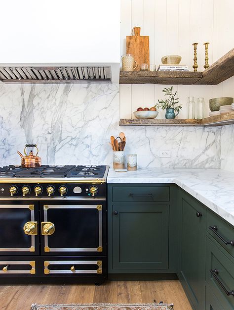 See why green kitchen cabinets are having a moment right now. Browse stunning spaces that utilize the hue and get paint ideas for your own kitchen. Dark Green Kitchen, Elegant Kitchen Design, Kitchen Design Color, Green Kitchen Cabinets, Marble Counter, Home Luxury, Green Cabinets, Amber Interiors, Elegant Kitchens