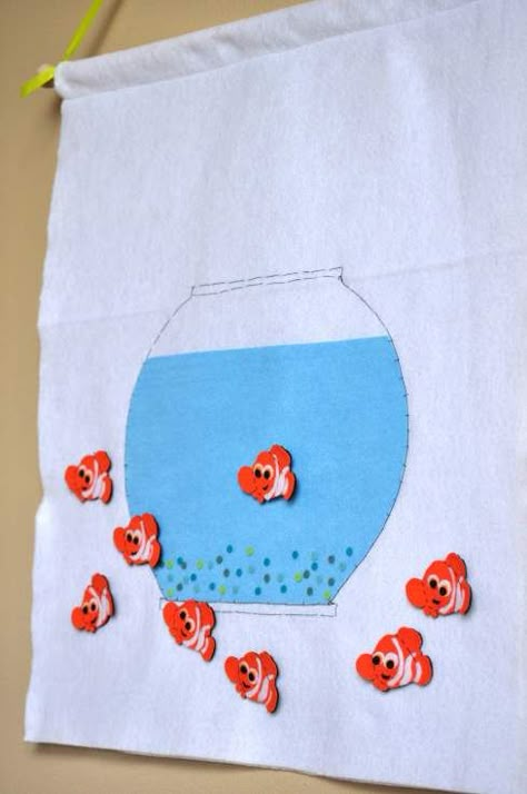 Pin the goldfish on the fish bowl game (for sale on Etsy - stellandlivi.etsy.com) Fish Bowl Game, Goldfish Party, Finding Dory Birthday Party, Dory Birthday Party, Finding Nemo Party, Finding Dory Birthday, Nemo Birthday Party, Dory Birthday, Finding Nemo Birthday