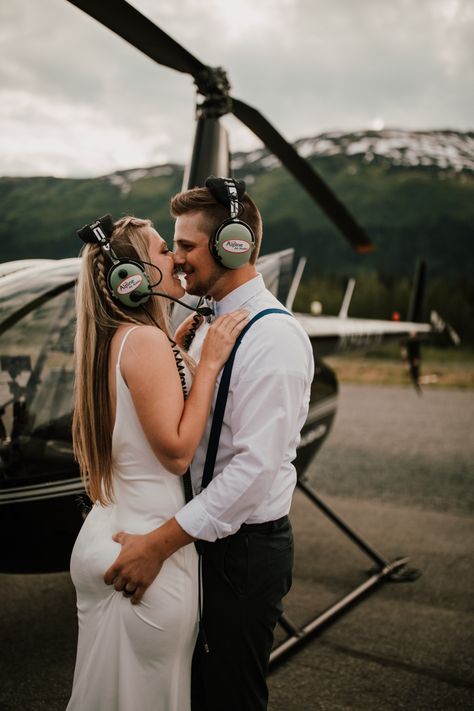 Helicopter Engagement Photos, Pilot Wedding Ideas, Hanger Wedding Reception, Airplane Elopement, Pilot Photoshoot, Plane Photoshoot, Alaskan Elopement, Airport Couple, Aviation Themed Wedding