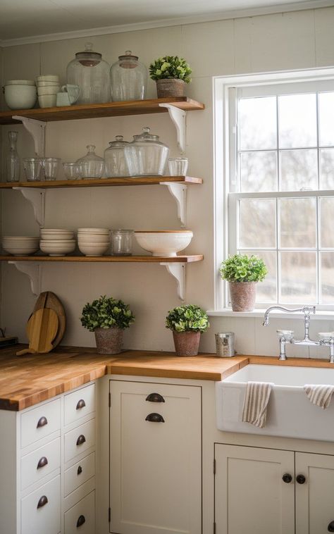 Explore cottage kitchen inspiration to bring warmth and personality to your small cottage kitchen. Whether it’s open shelving or colorful accents, the... Open Shelving In The Kitchen Ideas, Corner Shelf In Kitchen, Cottage Open Shelving, Kitchen Wall Colors With White Cabinets, Open Cabinet Kitchen, Small Kitchen Open Shelving, Diy Open Shelving Kitchen, Kitchen Wood Shelves, Small Rustic Kitchen