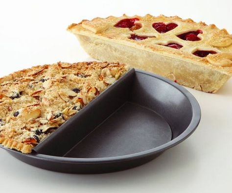 Please every palate at your table by baking multiple deserts at once using the 2-in-1 pie pan.  The innovative design of this cooking utensil makes it possible to bake 2 halves of pie at the same time so there's no compromising on desert. Split Decision, Kinds Of Pie, Pie Pan, Design Del Prodotto, Foodie Gifts, Pie Plate, Healthy Baking, Food Styling, Cooking Tips