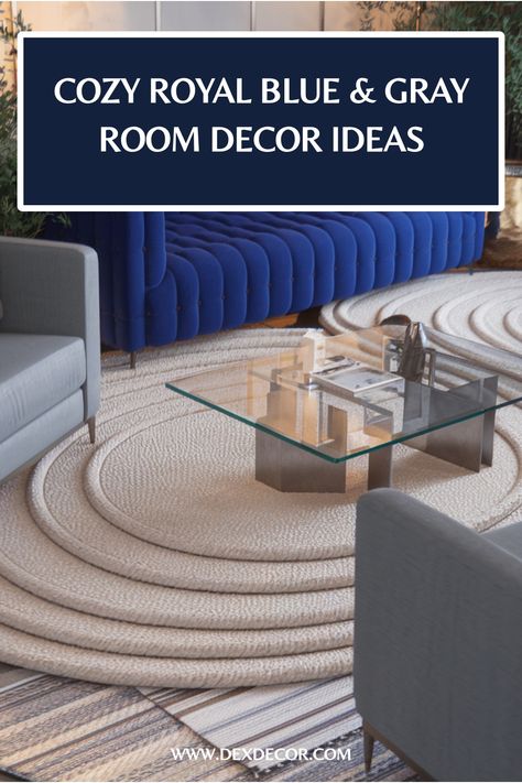 Royal blue couch and gray chairs in a stylish living room with a glass coffee table and spiral-patterned rug. Blue Gray Room, Blue And Gray Living Room, Gray Room Decor, Blue Grey Rooms, Royal Blue Sofa, Royal Blue Throw Pillows, Grey Room Decor, Gray Living Room Ideas, Blue Grey Walls