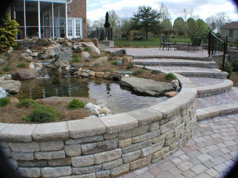 Retaining Wall with pond Pond Makeover, Retaining Wall Ideas, Raised Pond, Rockery Garden, Fish Pond Gardens, Garden Retaining Wall, Building A Pond, Garden Pond Design, Outdoor Ponds