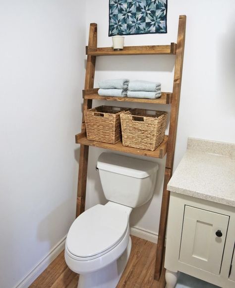 Leaning Bathroom Ladder Over Toilet Shelf Bathroom Ladder Shelf, Over The Toilet Ladder, Diy Bathroom Storage Ideas, Bathroom Ladder, Over Toilet Storage, Shelves Over Toilet, Toilet Shelves, Over The Toilet, Diy Bathroom Storage