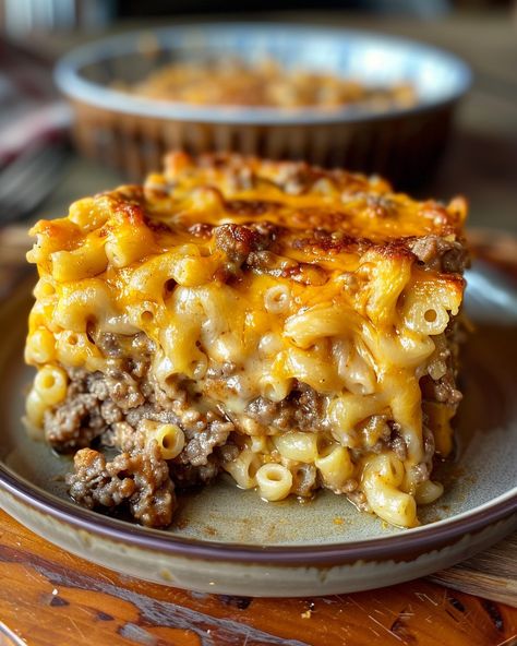 MAC AND CHEESE MEATLOAF CASSEROLE 🧀🍽️ Ingredients: 1 lb ground beef 1/2 cup breadcrumbs 1/4 cup milk 1 egg, beaten 1 tablespoon Worcestershire sauce 1 teaspoon garlic powder Salt and pepper, to taste 1 box (7.25 oz) macaroni and cheese dinner 1 cup shredded cheddar cheese 1/2 cup milk (for mac and cheese) 2 tablespoons butter (for mac and cheese) 1/4 cup chopped fresh parsley (optional, for garnish) Directions: Step 1: Prepare the Meatloaf Mixture Preheat your oven to 375°F (190°C). Grea... Mac And Cheese With Ground Beef, Mac And Cheese Meatloaf Casserole, Macaroni And Cheese Dinner, Beef Mac And Cheese, Cheese Meatloaf, Savory Meatloaf, Meatloaf Casserole, Cheese Stuffed Meatloaf, Cheesy Mac