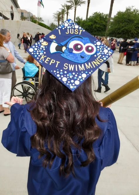 23 Best Graduation Cap Ideas You’ll Obsess Over Graduation Cap Designs Dory, Dory Cap Graduation, Finding Dory Graduation Cap, Graduation Cap Designs University, Just Keep Swimming Grad Cap, Marine Science Graduation Cap, 5th Grade Graduation Cap Ideas, Inside Out Grad Cap, Cap Decoration Graduation 8th Grade