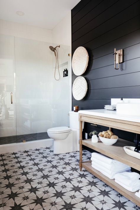 50 Farmhouse Bathroom Decor Ideas You Will LOVE - NP Black And White Bathroom With Shiplap, Black And White Patterned Tile Bathroom, Natural Wood Paneling Bathroom, White Tile With Black Accent, Black Star Tile Bathroom, Bathroom Black Shiplap, Black Bathroom Flooring, Patterned Tile Floor Bathroom, Pattern Tile Floor Bathroom