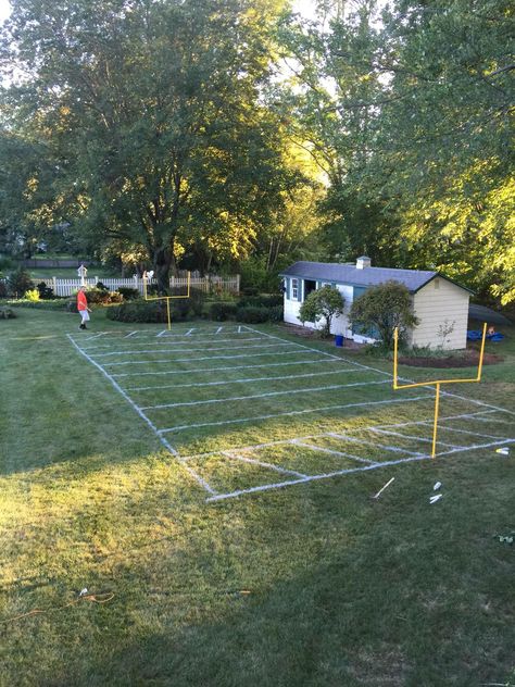 Backyard football field Football Field Backyard, Diy Soccer Field Backyard, Backyard Football Field, Home Football Field, Backyard Football Party, Diy Football Field, Flag Football Party, Sports Backyard, Backyard Football