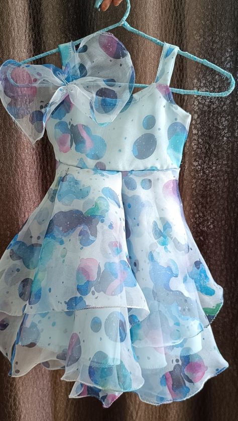 Baby frock of organza fabric. With 2 layer bottom and beautiful bow on one side. Organza Frocks, Frocks For Babies, Cotton Blouse Design, Baby Frock, Couple Dress, Stylish Dresses For Girls, Organza Fabric, Frock Design