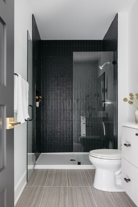 Black Shower White Floor, Black Vertical Tile Bathroom, Black Tile In Shower Wall, Shower Glass With Black Trim, Black Tile Feature Wall Bathroom, Matte Black Subway Tile Bathroom, Black Tile Shower Tub Combo, Black Shower Tile With Tub, Black Accent Shower Wall