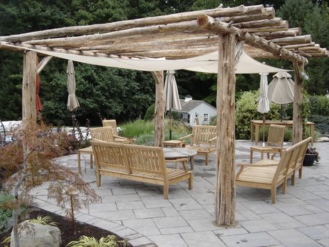 Natural Wood Pergola, Cedar Pergola Ideas, Log Pergola Rustic, Driftwood Pergola, Natural Pergola, Rustic Pergola Ideas, Log Pergola, Tree Pergola, Backyard Pergola Ideas