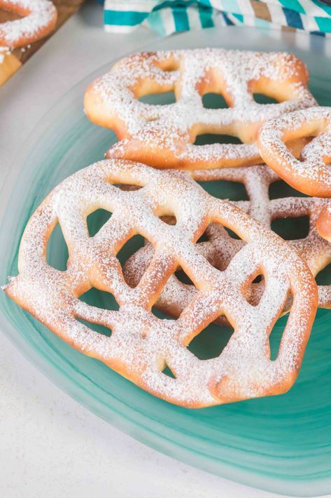 Get fair-style funnel cakes right at home with your air fryer! These golden, crispy treats are lightened up with less oil but still packed with that delicious crispy texture. Ready in under 10 minutes, top with powdered sugar, chocolate sauce, or your favorite toppings for the ultimate sweet indulgence. Perfect for family movie nights, dessert, or any time you're craving a nostalgic treat! Air Fryer Funnel Cake, Funnel Cake Recipe, Funnel Cakes, Easy Air Fryer, Funnel Cake, Crispy Treats, Family Movie, Air Frying, Chocolate Sauce