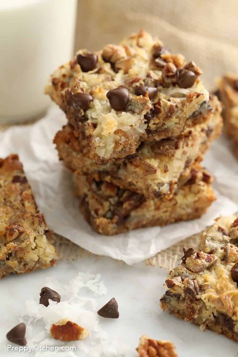 Magic Cookie Bars. My mom used to make these; she added butterscotch chips and we called them Chippy Dippy Bars! These easy, delicious magic cookie bars are perfectly sweet, crunchy, chewy, gooey anytime treats filled with coconut, chocolate, peanut butter and pecans that you can whip up in a flash! Magic Cookie Bar Recipe, Baking Therapy, Toffee Chips, Magic Cookie Bars, Cowboy Cookies, Preppy Kitchen, Pecan Pie Bars, Macaroon Recipes, Butterscotch Chips