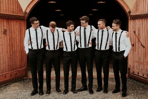 On the Ranch: Bohemian + Fiesta-Inspired Wedding in Oregon - Green Wedding Shoes Groom And Groomsmen Attire Suspenders, Black Suit With Suspenders Groomsmen, Black Groomsmen Attire Casual, Groomsmen Vest And Bowtie, Suspenders Wedding Black, Casual Groomsmen Attire Black, Groomsmen Suspenders And Tie, Black Suspenders Groomsmen, Suspenders With Tie