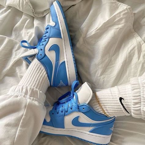 Air Jordan 1 Low UNC Blue White fashion shoes sneakers for women and men. Unc Jordan 1, Jordan Unc, Jordan 1 Unc, White Basketball Shoes, Blue Jordans, Jordan Shoes Girls, Nike Socks, Air Jordan Sneakers, Hype Shoes