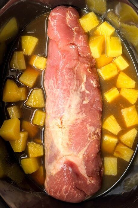 Looking for an easy and delicious dinner idea? This Crockpot Hawaiian Pineapple Pork Tenderloin, with only 3 ingredients and a quick 5-minute prep time, is not only incredibly tasty and tender but also likely to become a favorite! Its versatility in serving options makes it an ideal dish for busy weeknight dinners or laid-back weekend cooking. Hawaiian Pineapple Pork, Pineapple Pork Tenderloin, Tenderloin Crockpot, Pork Tenderloin Crock Pot Recipes, Teriyaki Pork Tenderloin, Crockpot Pork Loin, Crockpot Pork Tenderloin, Pork Crockpot Recipes, Teriyaki Pork