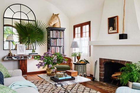 Kevin Isbell Brings New Life to a Spanish Revival Bungalow in L.A Lime Green Walls, California Home Design, Saarinen Table, Spanish Revival Home, Upholstered Banquette, Built In Banquette, Octagon Table, Layered Style, Walnut Dining Table