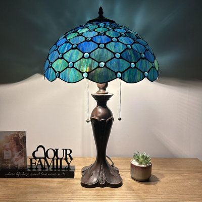 Resin base with bronze finish.. Each piece of stained glass is hand-soldered into place using the traditional copper foil technique. | Astoria Grand Haruko Tiffany Table Lamp Blue Stained Glass Crystal Beans LED Bulbs Included 16"W*16"D*24"H 24.0 H x 16.0 W x 16.0 D | 24" H X 16" W X 16" D | Wayfair Stain Glass Lamps, Moody Study, Dream Scapes, Stained Glass Crystal, Blue Tiffany Lamp, Christmas Stained Glass, Stained Glass Lamp Shades, Stained Glass Lamp, Stained Glass Table Lamps