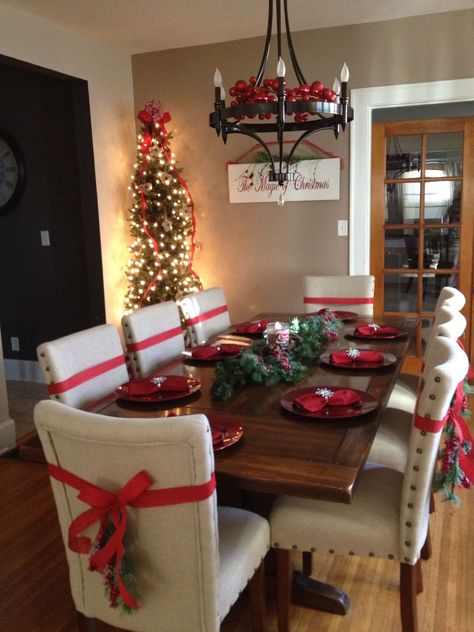 45+ Best Christmas Decorating ideas | A complete guide Pencil Christmas Tree Dining Room, Tree Placement, Pencil Tree, Xmas Table, Christmas Decorations Cheap, Tafel Decor, Christmas Dining Room, Chair Decor, Christmas Tablescape