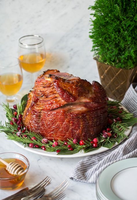 Honey Baked Ham on a serving platter garnished with a wreath of fresh rosemary, bay leaves and cranberries. Ham Platter Presentation, Ham Platter, Platter Presentation, Thanksgiving Ham, Spiral Sliced Ham, Honey Glazed Ham, Ham Glaze Recipe, Honey Baked, Veal Recipes