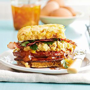 Can't choose between biscuits and gravy and an egg sandwich? Combine both in one savory, scrumptious package with this sweet potato biscuits, scrambled eggs, bacon, ham, and red eye gravy. Biscuit Sandwiches, Red Eye Gravy, Best Breakfast Sandwich, Breakfast Sandwich Recipes, Sweet Potato Biscuits, Leftover Ham Recipes, Biscuit Sandwich, Ham Recipes, Best Breakfast Recipes