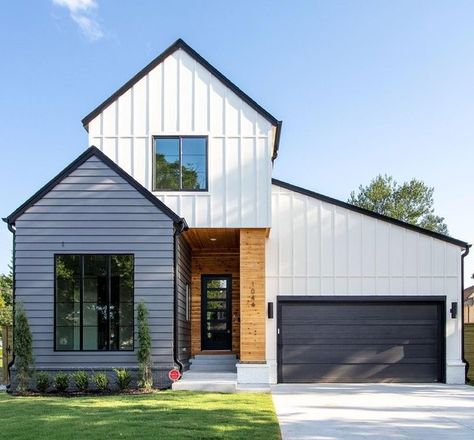 8 Striking Black Garage Door Ideas to Up Your Curb Appeal Ultra Modern Farmhouse, Florida Farmhouse, Black Garage, Home Designs Exterior, Different Elements, Contemporary Exterior, Modern Farmhouse Exterior, Casa Exterior, Farmhouse Exterior