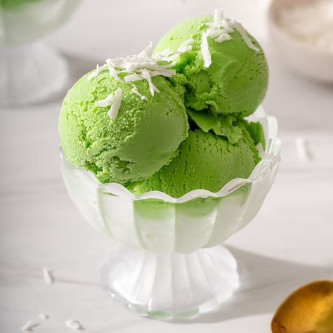 This pandan ice cream is infused with fresh pandan flavor and will be your favorite way to beat the heat this summer! This vibrantly green ice cream has a rich pandan, coconut flavor, and a creamy texture that is easy to make right at home. Pandan Ice Cream, Aesthetic Archive, Green Ice Cream, Coconut Milk Ice Cream, Cheesecake Recipes Classic, Ice Cream Containers, Ice Cream Mixture, Custard Filling, Asian Grocery