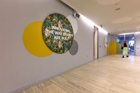 Office Wall Graphics Creative, Nestle Office, Wall Branding, Fun Signage, Office Wall Graphics, Office Reception Design, Bespoke Joinery, Office Graphics, Grey Interiors