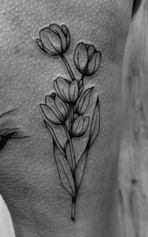 Tulip Half Sleeve Tattoo, Tulip Tattoo For Men, Bunch Of Tulips Tattoo, Tulip Tattoo Design For Women, Black And White Tulip Tattoo, Tulip Sleeve Tattoo, Tulip Sternum Tattoo, Tulip Hip Tattoo, Tulip Tattoo Traditional