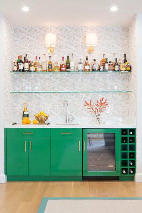 The home bar shown in the image above is stylish and eclectic, using bold colors to create this fun home wet bar. Green Kitchen Decor, Home Wet Bar, Basement Bar Designs, Home Bar Design, Green Bar, Home Bar Designs, Bar Cart Decor, Green Cabinets, Basement Bar