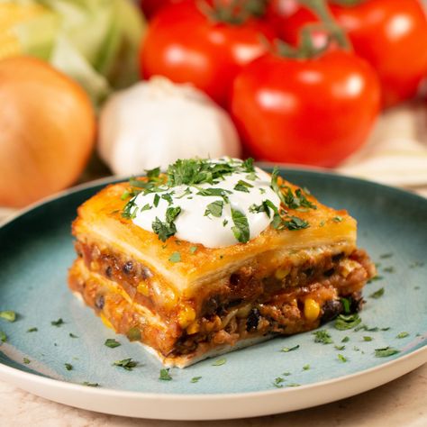 Taco Lasagna Recipe by Tasty Taco Lasagna Recipe, Taco Lasagna, Plant Based Recipe, Cooking Tricks, Frijoles Refritos, Tv Chefs, Recipe Cookbook, Spring Cocktails, Prep Recipes