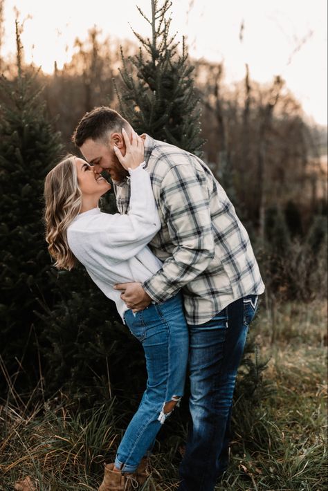 Casual Couple Christmas Pictures, Couples Photoshoot Tree Farm, Couple Poses In Front Of Christmas Tree, Couple Tree Farm Pictures, Couple Christmas Tree Farm Photos, Couple Christmas Tree Photos, Tree Farm Couple Pictures, Tree Farm Engagement Pictures, Christmas Tree Farm Engagement Pictures