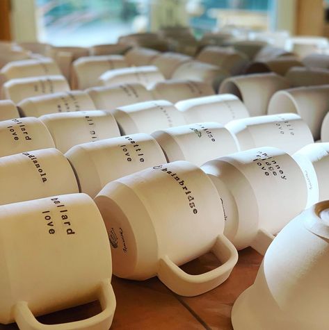 Glaze Day! Yesterday I unloaded the kiln, under glazed the text, and fired another load of bisque. Today I’ll glaze this batch and hopefully get to unloading the next batch for glazing. #mugmaker #maker #makerlife #seattlemug #bainbridgeisland #seattle #coffeecounrty #mugshotmonday #northwestisbest #coffee #coffeetime #ceramic #stoneware #ineedanintern #createabeautifullife #curateyourlife #studiolife #potterystudio #citymugs #handmade #handcrafted #100mugsby2019 #setabeautifultable #coffeetaste Handmade Pottery Mugs, Letter Mugs, Artisan Pottery, Do It Yourself Crafts, Cool Lettering, Stoneware Ceramics, Potters Wheel, Coffee Gifts, The Text