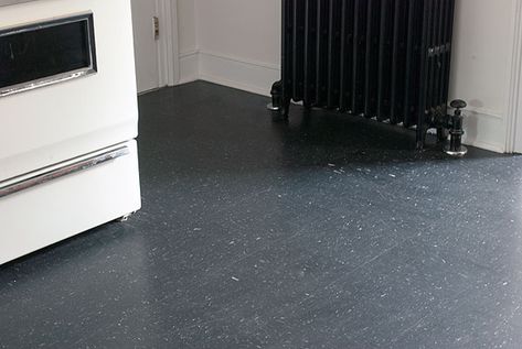 All of the black VCT (Vinyl Composition Tile) flooring, and supplies only cost about $200 (I used Tarkett brand, which is $.66 per square foot)  This is the floor for really great Manhattan Nest Kitchen (see Kitchen pin board) Marmoleum Floors Kitchen, Apartment Flooring, Vinyl Kitchen Floor, Temporary Kitchen, Vct Flooring, Marmoleum Floors, Small Basement Bathroom, Cheap Floor, Vintage Vinyl Flooring