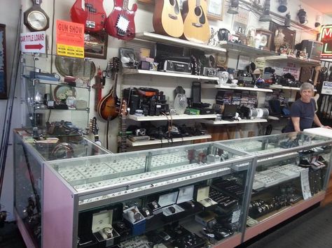 The interior of Crown Pawn Shop, Roscoe Boulevard, Canoga Park, Los Angeles. Credit Rab Fallon for the photos. Pawn Shop Aesthetic, Bloxburg Town, Lana Del Rey Songs, Car Game, Canoga Park, Car Games, Pawn Shop, Shop Ideas, Shop Interior