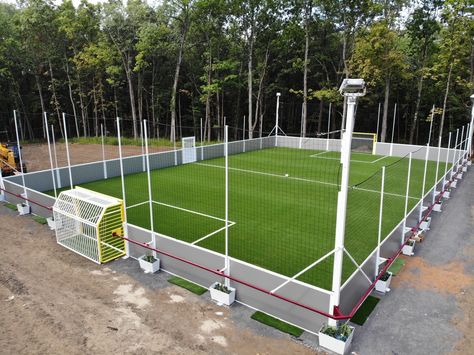 We built a 60x90 soccer field with walls in a families backyard in Upstate NY. Soccer Field At Home, Outdoor Soccer Field, Backyard Soccer Pitch, Diy Soccer Field Backyard, Backyard Football Field, Backyard Soccer Field Ideas, Home Soccer Field, Backyard Soccer Field, Backyard Soccer