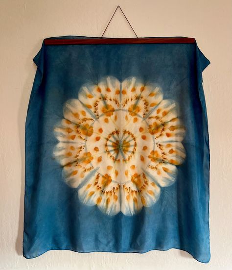 This is a special piece! Large (30"x30") lightweight (8mm) habotai silk scarf, hand-dyed in two stages: 1) Shibori itajima (shape resist) technique in my indigo vat for the blue pattern 2) Home-grown tango cosmos and coreposis flowers dyed into the silk for the mandala pattern.  The silk is super soft, it feels lovely against the skin. It's a generous size, works well as a shawl of a scarf, and also makes a lovely wall hanging.   my process  I dye all my pieces in my home, using flowers, woods a Shibori Scarf, Large Silk Scarf, Habotai Silk, Indigo Shibori, Organic Dyes, Mandala Pattern, Japanese Design, Scarf Pattern, Shibori