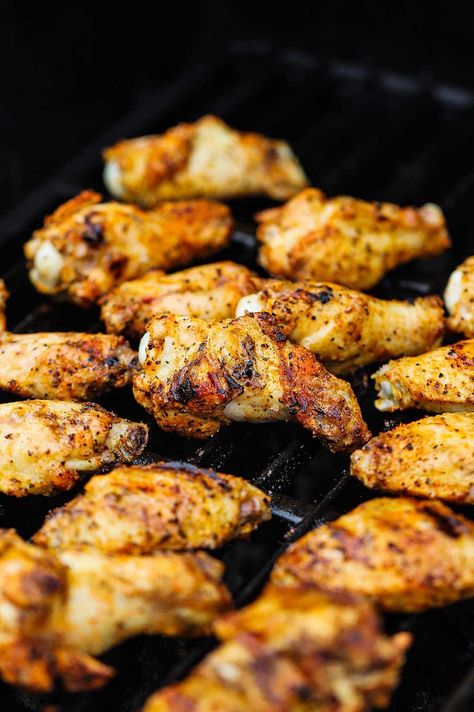 Seasoned chicken wings on a gas grill and they are lightly charred. Grilling Wings On Gas Grill, Seasoned Chicken Wings, Homemade Blue Cheese Dressing, Homemade Blue Cheese, Cooking Chicken Wings, Grilled Wings, Grilled Chicken Wings, Crispy Wings, Easy Grilled Chicken