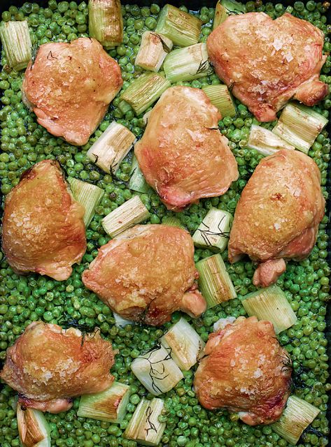 I thought I had exhausted the culinary possibilities of a pack of frozen peas, but my friend, and excellent cook, Alex Andreou, led me by the hand – it does take a leap of faith – to his method of using them, still frozen, as the first layer of a traybake. It’s a life-changer. The peas become soft and sweet in the heat – duller in colour, but so much more vibrant in flavour – and the steam they produce as they bake makes the chicken beautifully tender, its skin crackly and crisp on top. What’s k