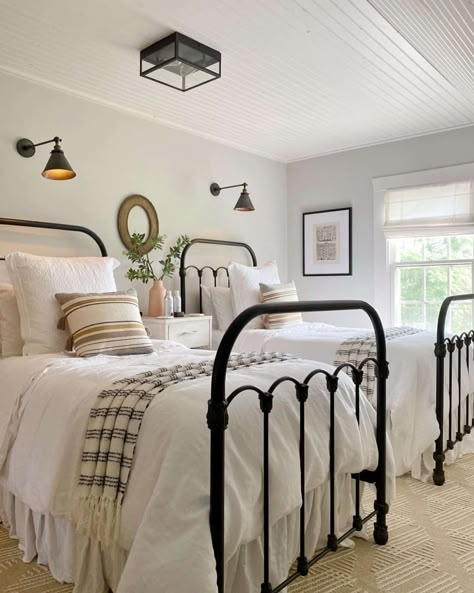 22 Matching Twin Bedroom Ideas That Work for Small Rooms Farmhouse Guest Bedroom With Twin Beds, White Twin Beds Guest Room, Twin Metal Bed Frame Bedroom Ideas, Twin Beds Guest Room Farmhouse, Twin Guest Bedroom, Simple Bedroom Ideas For Small Rooms, Twin Bedroom Decor, Twin Bedding Sets, Twin Beds Guest Room