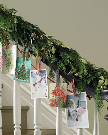 DIY Christmas Tree Garland Ideas to Personalize Your Holiday | Sorry tinsel, your time is over. These festive embellishments are the perfect garland to adorn your Christmas tree. Gather all of the cards from your friends and family, near and far, and hang them on a clothesline for a garland with real sentiment.  #christmas #crafts #marthastewart #DIYdecor Holiday Card Display, Christmas Stairs Decorations, Christmas Stairs, Christmas Card Display, Christmas Staircase, Garland Ideas, Holiday Organization, Easy Holidays Crafts, 12 December